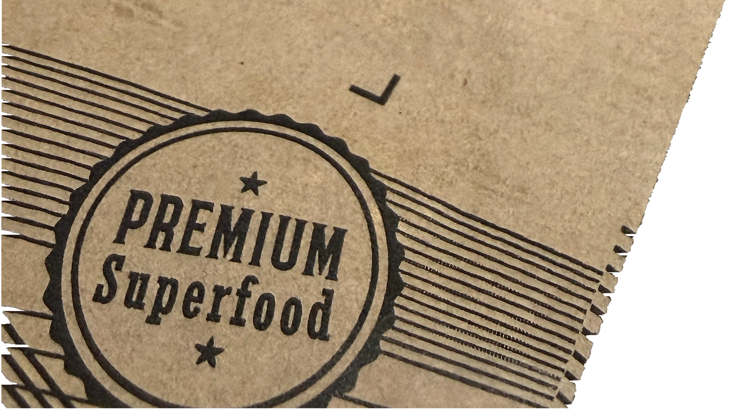 Detalle del sello Premium y las líneas del envase kraft Organikal Superfoods